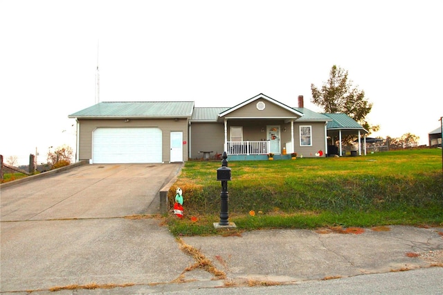 single story home featuring a porch, a front lawn, and a garage