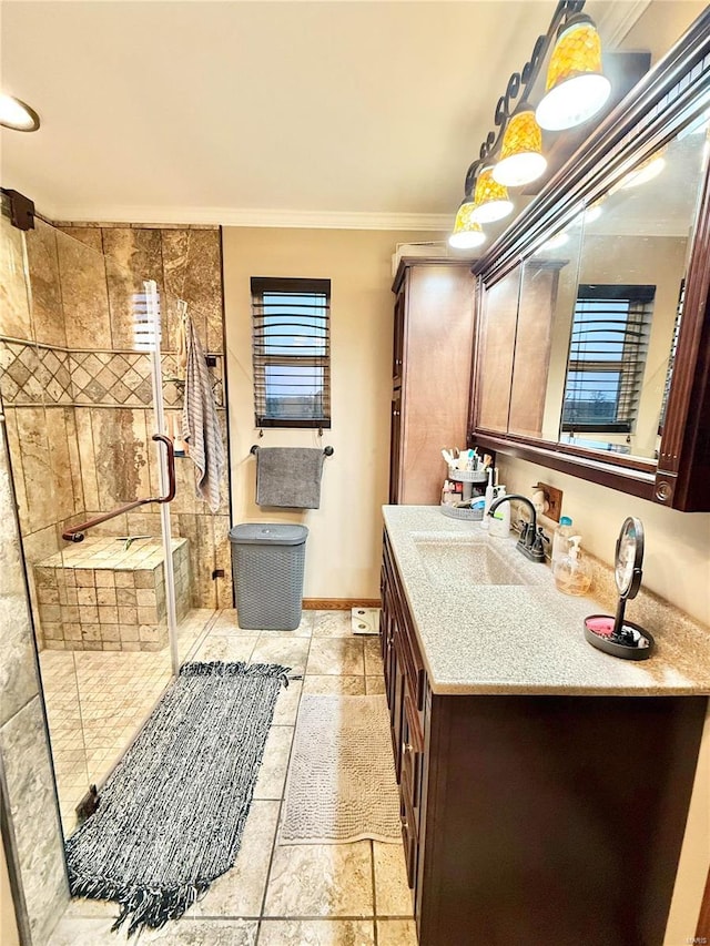 bathroom with vanity, ornamental molding, and walk in shower