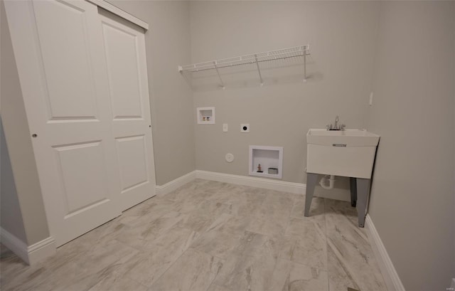 laundry area with hookup for a washing machine, gas dryer hookup, and hookup for an electric dryer