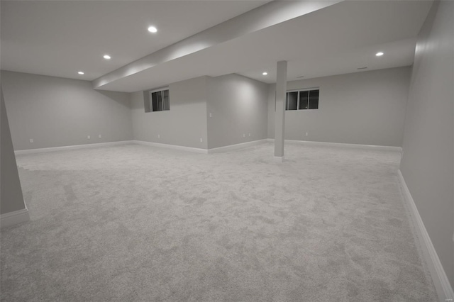 basement with light colored carpet