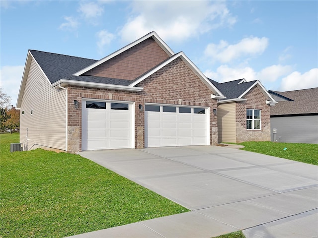 craftsman inspired home with a garage and a front lawn