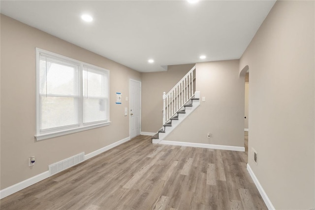 entryway with light hardwood / wood-style floors