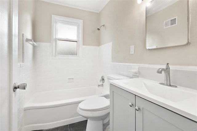 full bathroom with tile walls, vanity, bathtub / shower combination, tile patterned flooring, and toilet