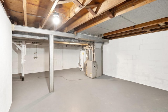 basement with gas water heater and heating unit