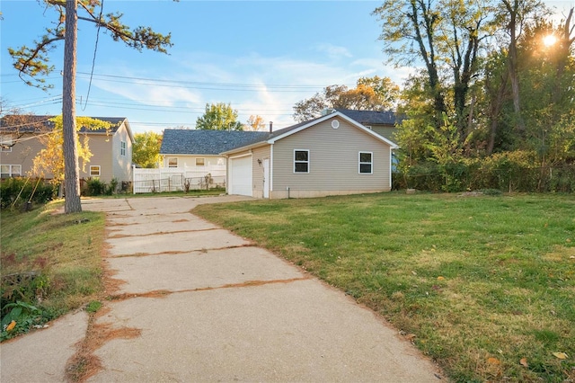 view of side of home with a lawn