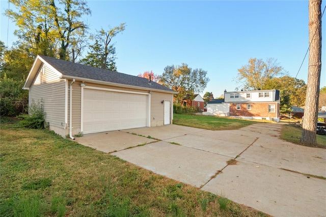 garage with a yard