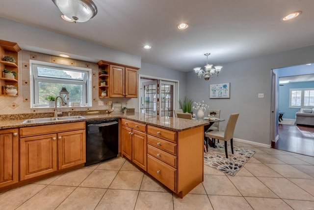 kitchen with tasteful backsplash, stone counters, sink, dishwasher, and kitchen peninsula