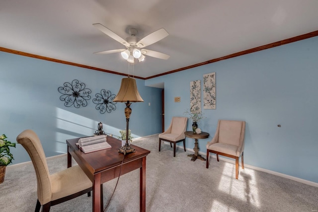 office area with ceiling fan, ornamental molding, and carpet