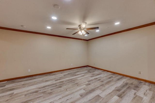 unfurnished room featuring light wood-type flooring, ceiling fan, and crown molding