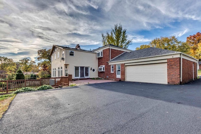 front facade with a garage