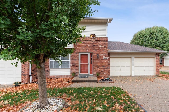 view of front of home with a garage