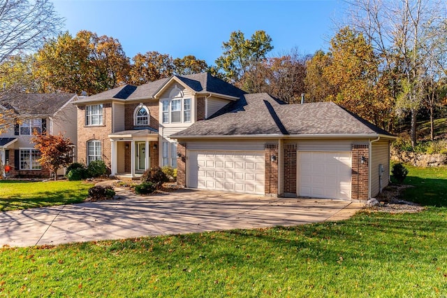 view of front of house with a garage and a front lawn