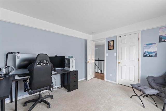 office area with light colored carpet