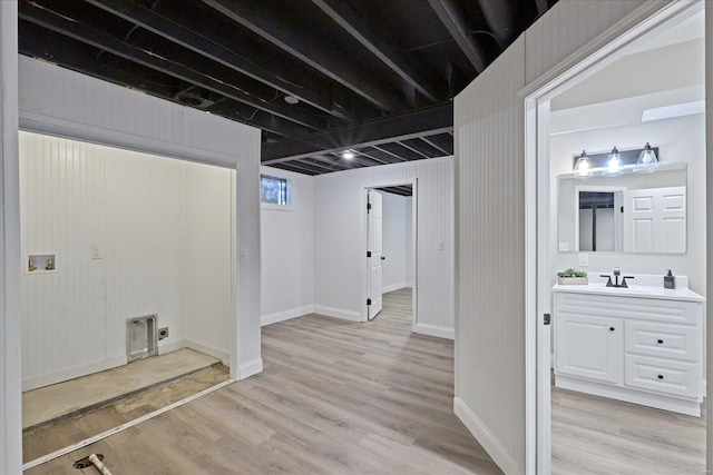 interior space featuring light hardwood / wood-style floors and sink