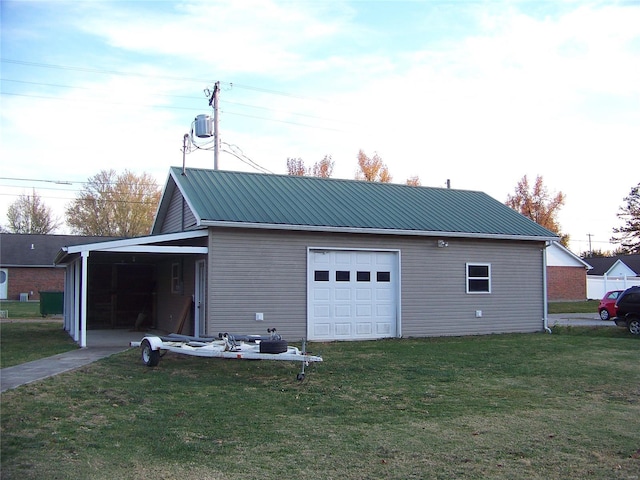 garage with a yard