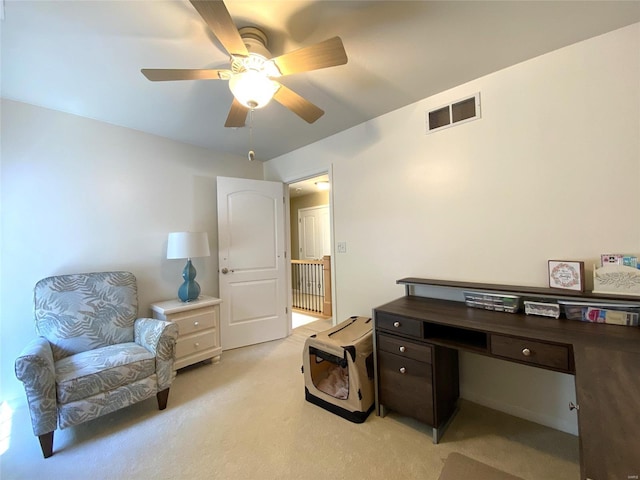 office area with light carpet and ceiling fan