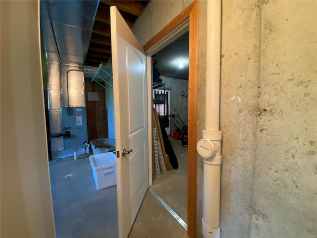 corridor featuring concrete flooring