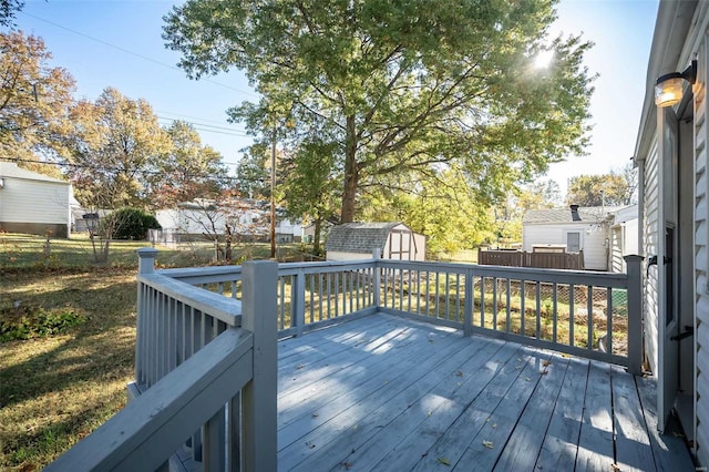 wooden deck with a shed