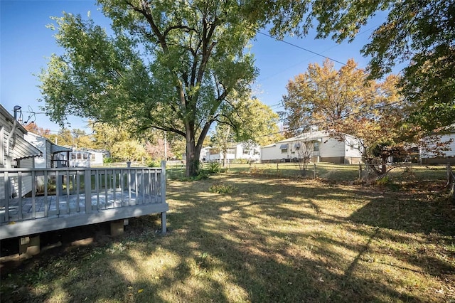 view of yard featuring a wooden deck