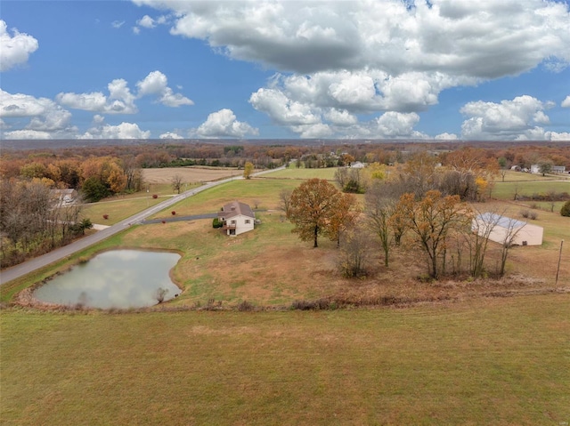 bird's eye view with a water view and a rural view