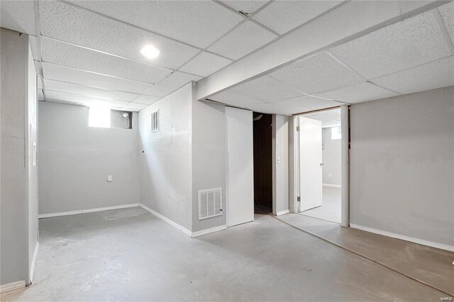 basement with a drop ceiling