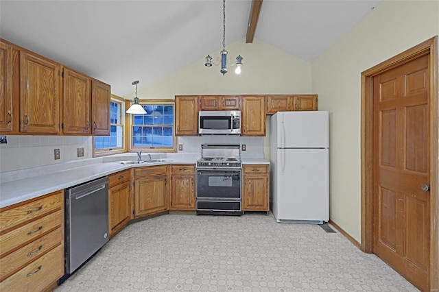 kitchen featuring sink, beamed ceiling, backsplash, pendant lighting, and appliances with stainless steel finishes