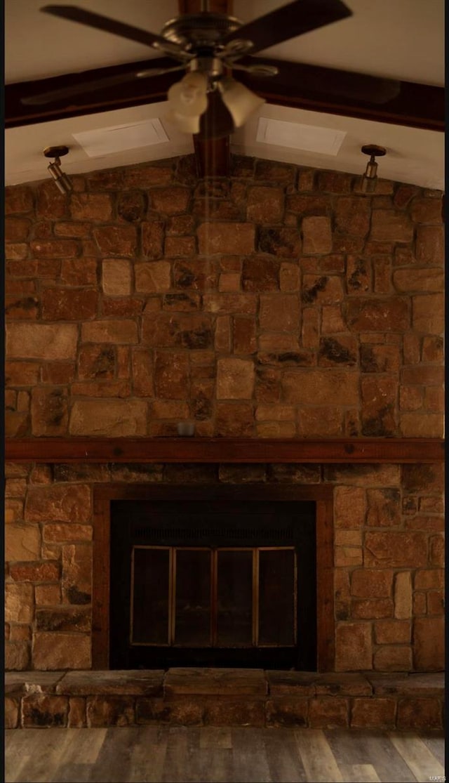 room details featuring hardwood / wood-style flooring, ceiling fan, and beam ceiling