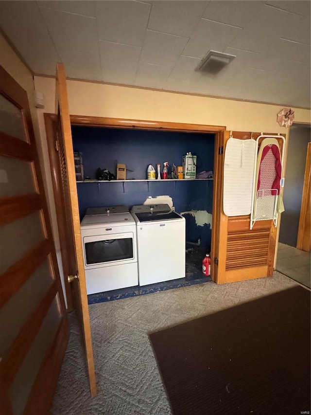 interior space with washer and dryer and carpet flooring