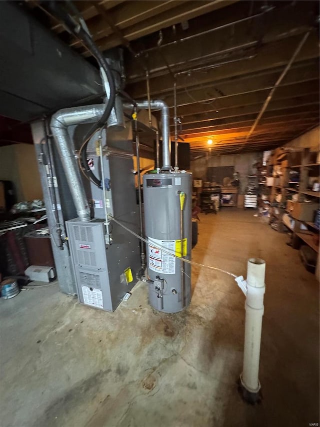 utility room featuring water heater and heating unit