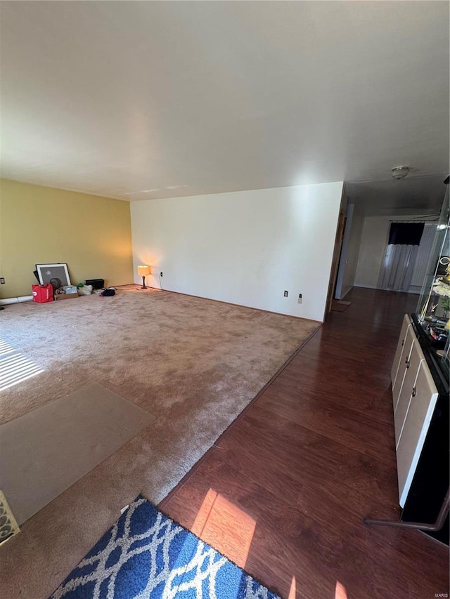 living room featuring dark hardwood / wood-style flooring