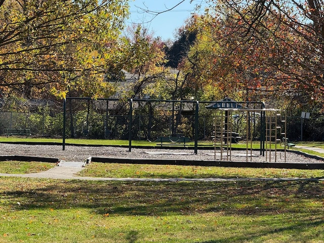 view of community featuring a yard and a playground