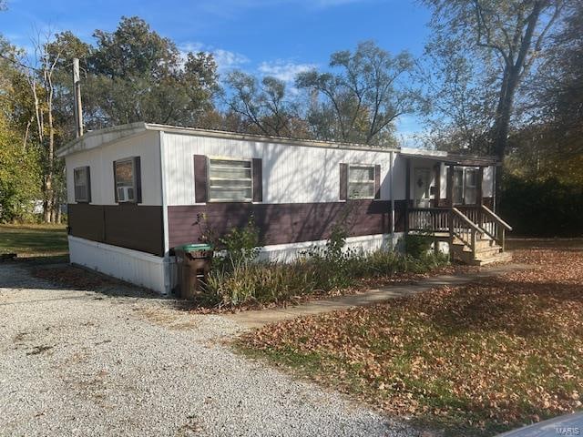 view of home's exterior with cooling unit