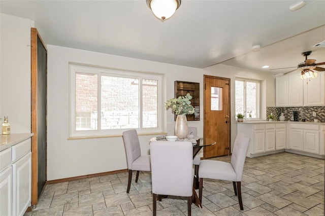 dining room featuring a wealth of natural light and ceiling fan