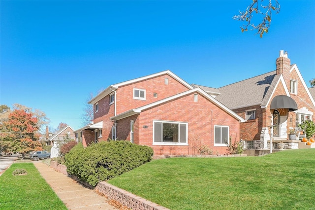 view of property exterior featuring a yard