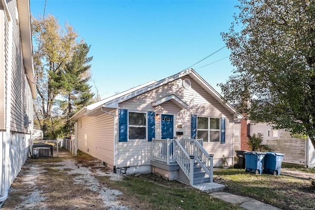 bungalow with central AC unit