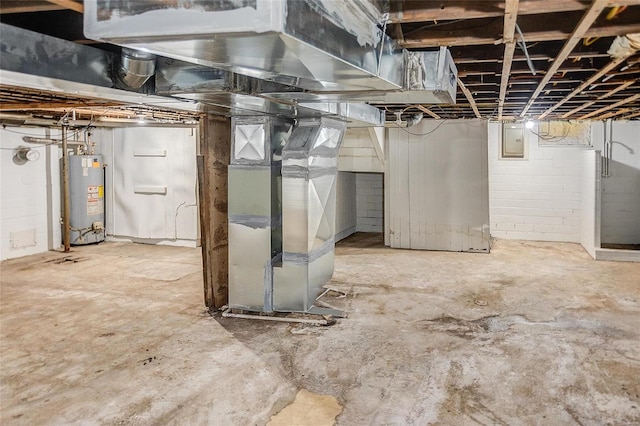 basement with water heater, electric panel, and heating unit