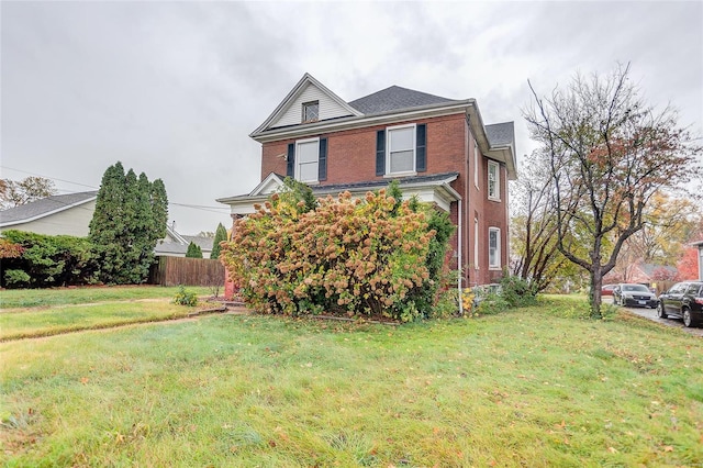 view of front of home with a front lawn