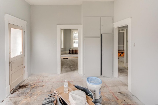 entryway featuring radiator