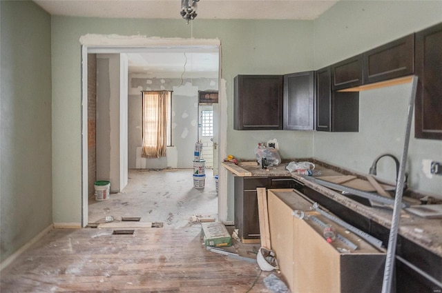 kitchen featuring dark brown cabinets