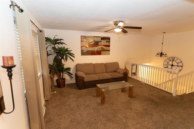 living room with dark colored carpet and ceiling fan