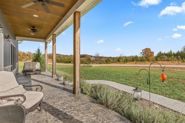 view of patio featuring ceiling fan