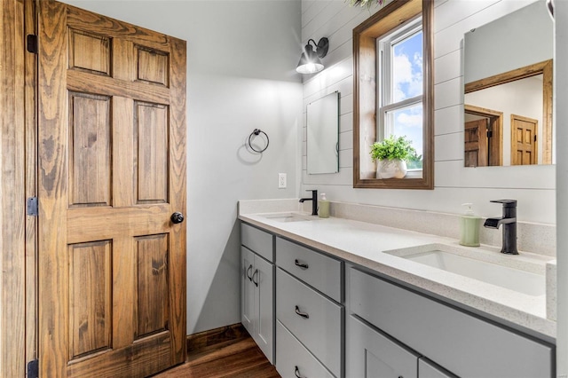 bathroom featuring hardwood / wood-style floors and vanity