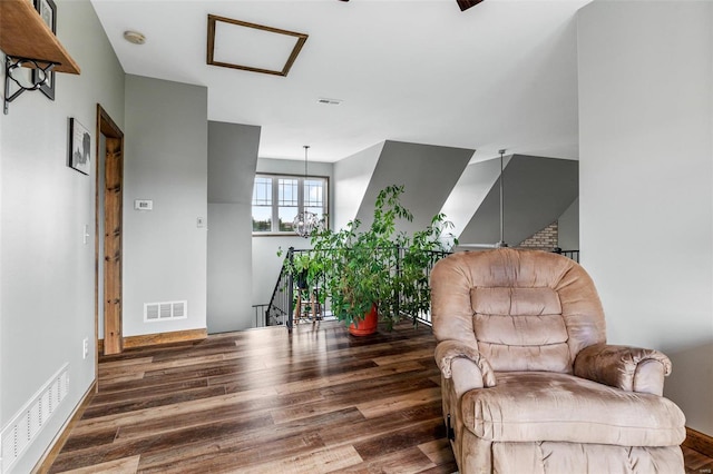 living area with dark hardwood / wood-style floors