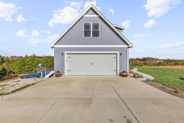 garage with a yard