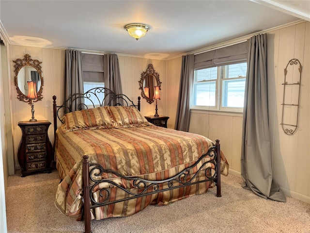 bedroom featuring carpet floors and baseboards