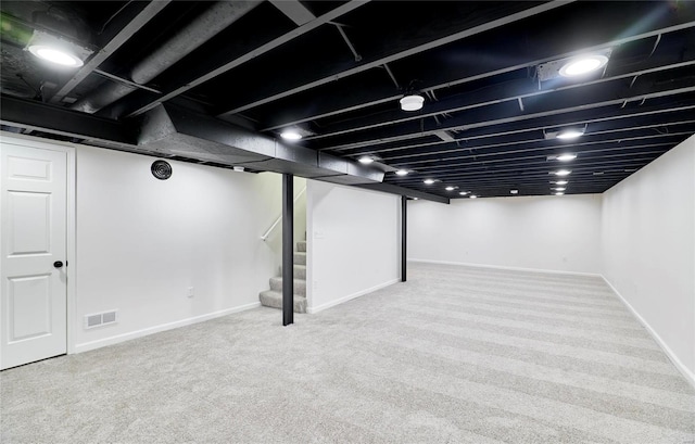 basement with carpet floors