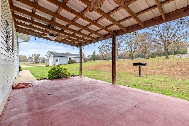 view of patio featuring ceiling fan