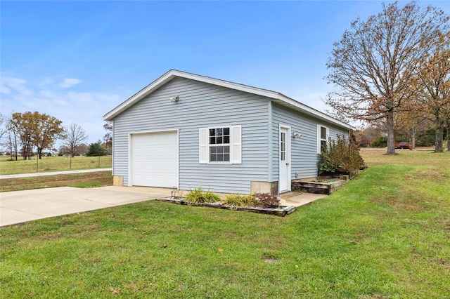 garage with a yard