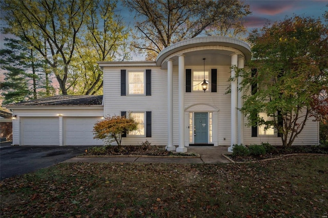 view of front of home with a garage