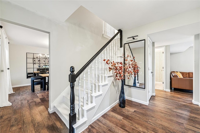 stairway with wood-type flooring